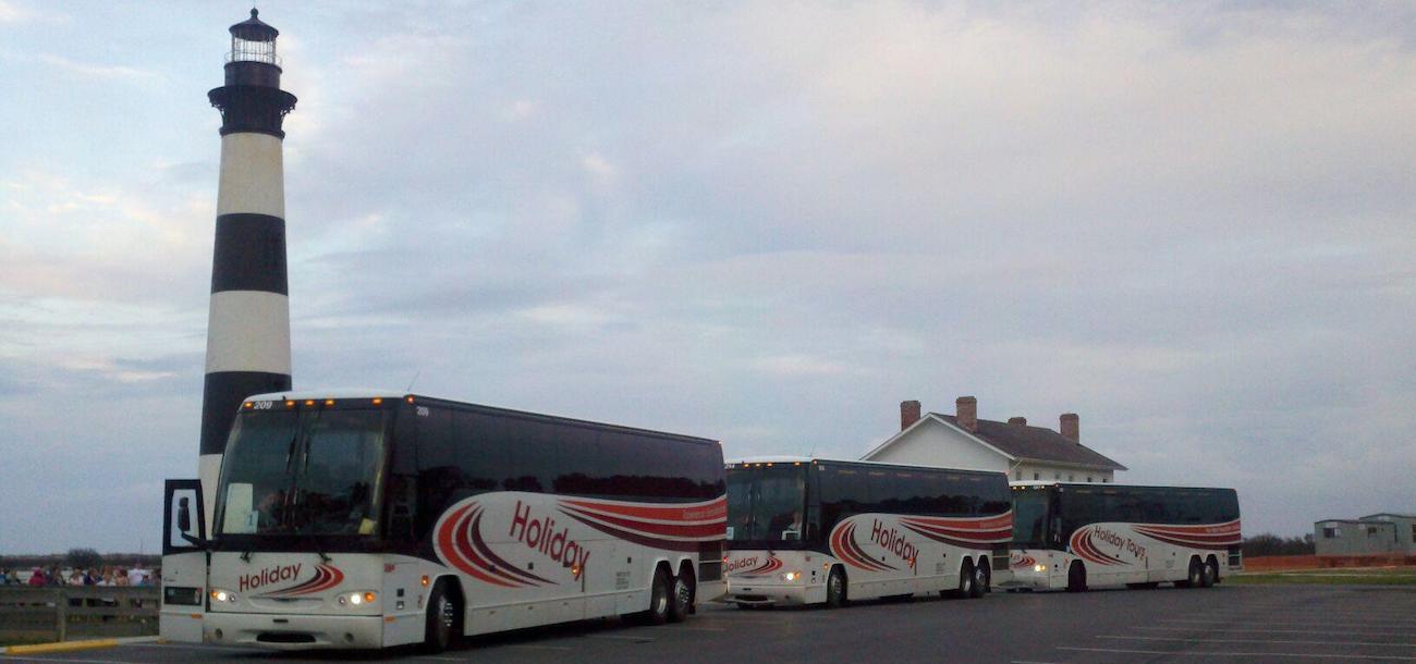Buses in front of Bodie Island Lighthouse